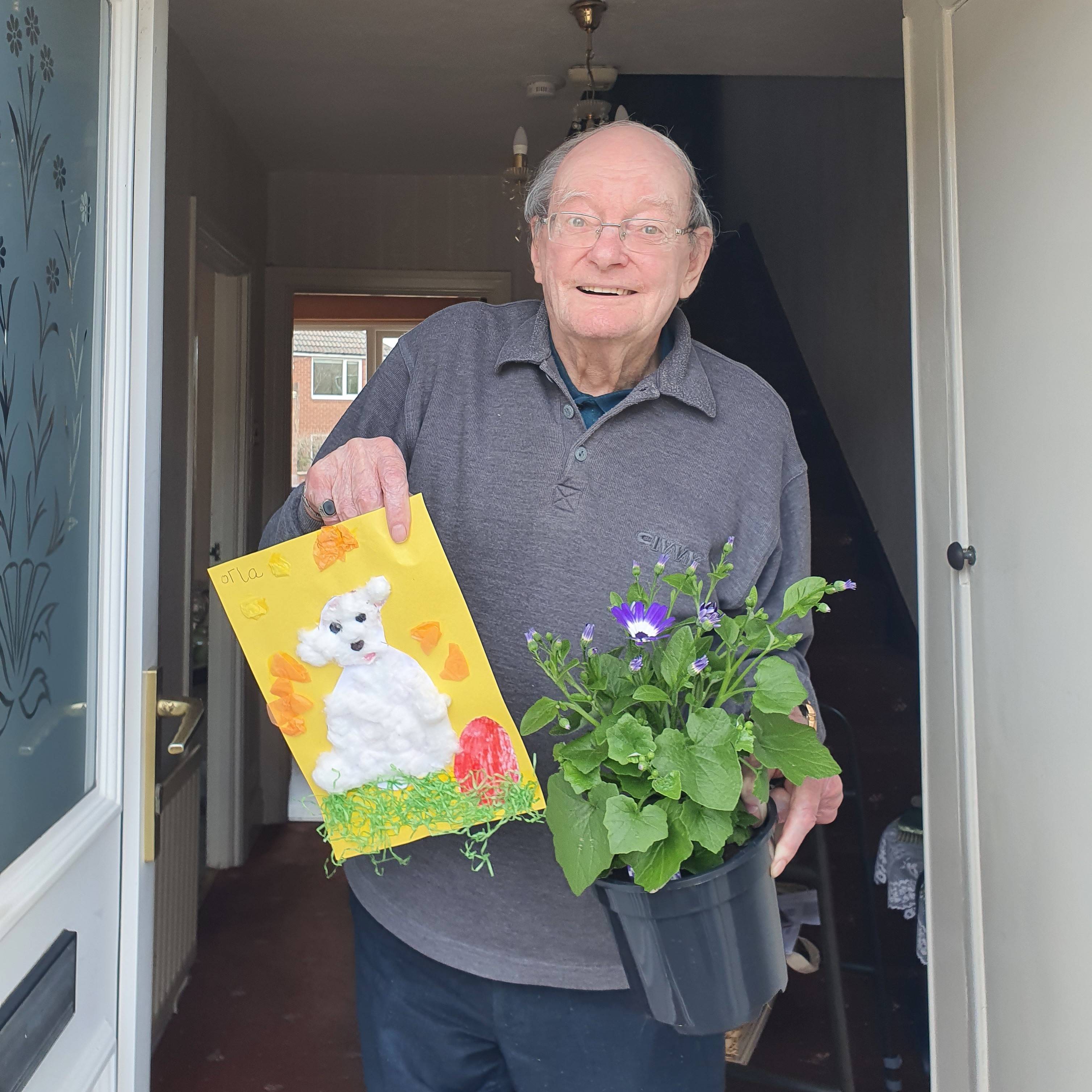 Rowlands Gill resident Denis Willis receiving a spring package