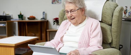An image of a woman on a computer
