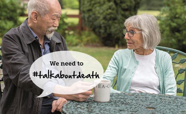 Older man and woman at table #TalkAboutDeath