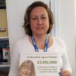 Anne Marie Trevelyan MP, holding our poster